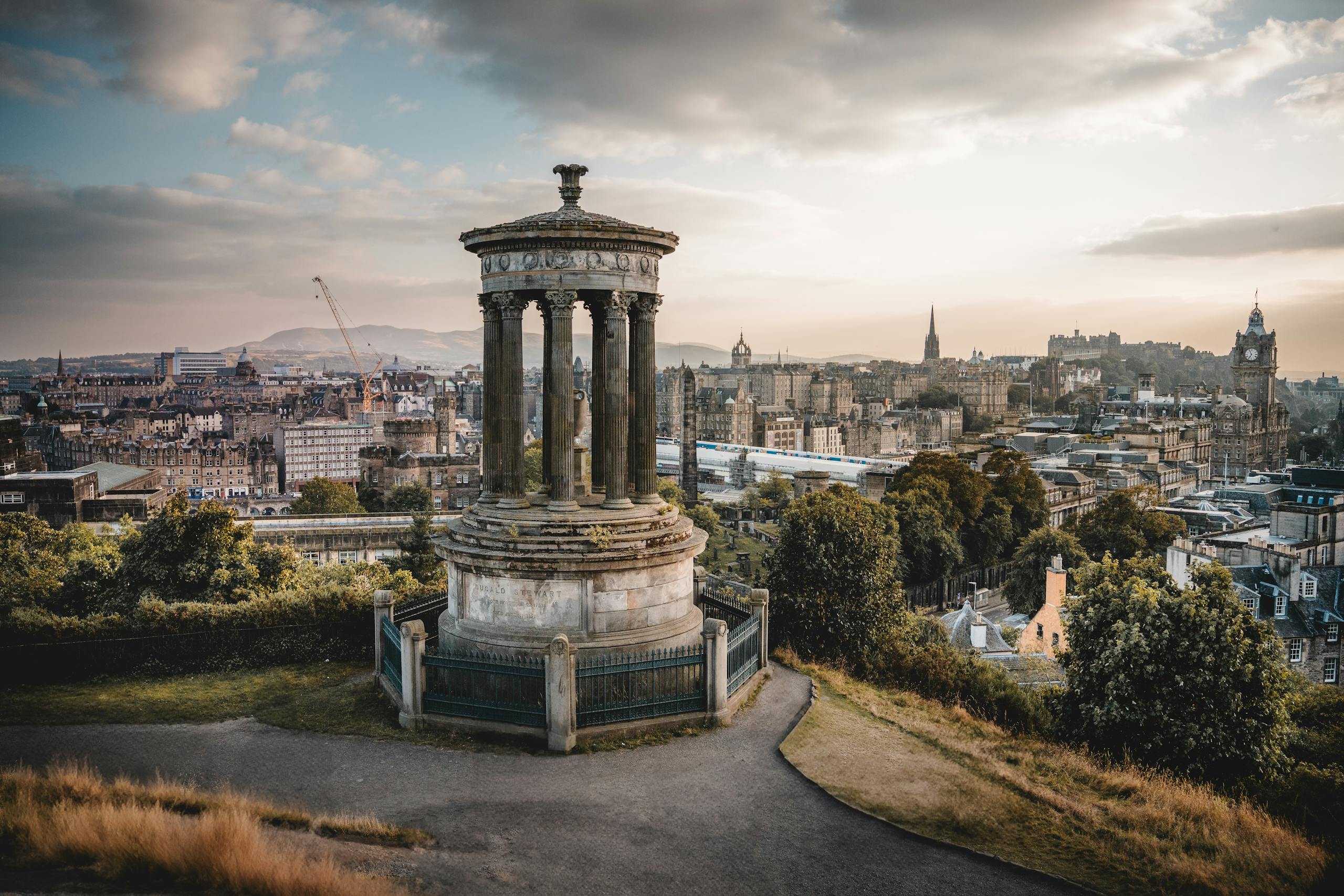 Captivating view from Calton Hill in Edinburgh showcasing historic architecture at sunset.